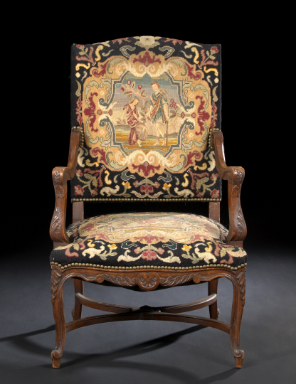 Appraisal: Provincial Louis XV-Style Walnut Fauteuil third quarter th century the