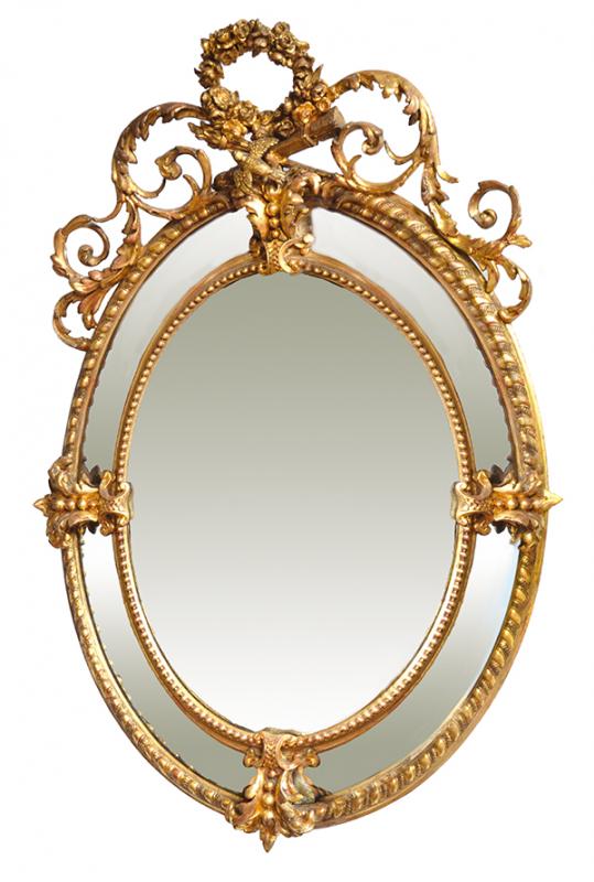 Appraisal: AN OVAL FRAMED FRENCH GILT WOOD FRAMED WALL MIRROR the