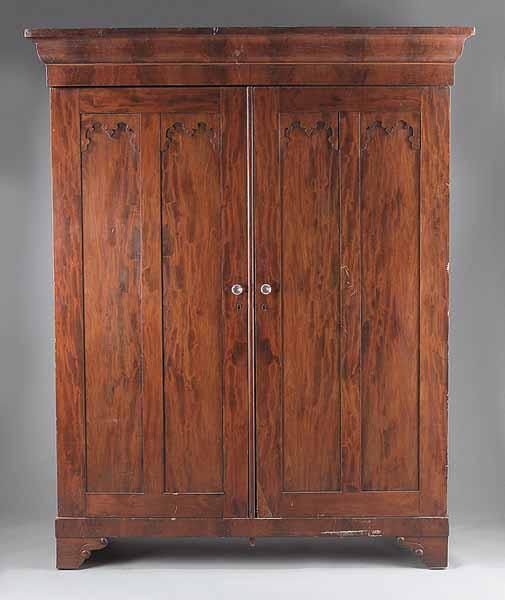 Appraisal: An American Late Classical Mahogany Armoire c shaped pediment double