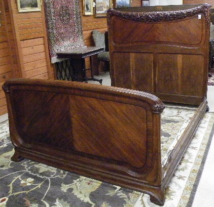 Appraisal: CARVED AND MOLDED MAHOGANY BED WITH RAILS full double size