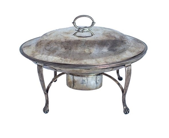 Appraisal: An oval entree dish with a silver lid and heating