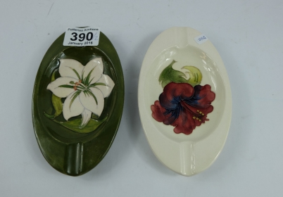 Appraisal: Moorcroft oval ashtray decorated in the hibiscus design chip to