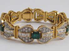 Appraisal: A yellow metal tests carat gold emerald and diamond bracelet