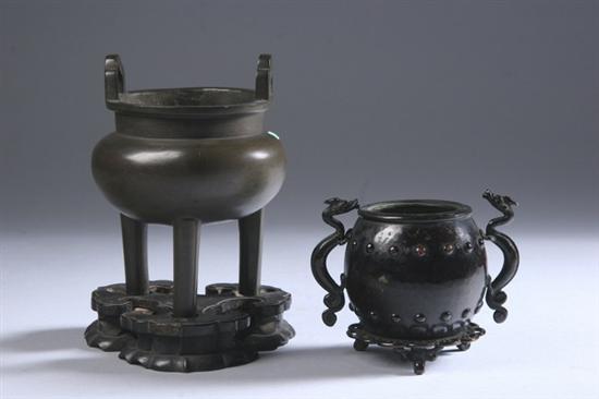 Appraisal: TWO CHINESE BRONZE CENSERS One tripod with inlaid decoration the