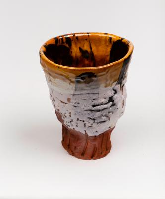 Appraisal: Simon Carroll - An earthenware tea bowl with coloured glazes