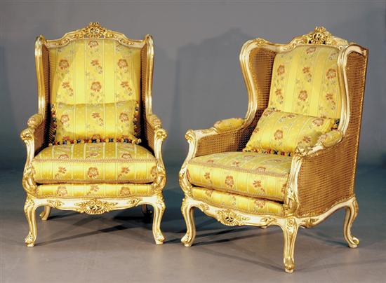 Appraisal: Pair Louis XV style carved giltwood and caned armchairs bead-and-channel