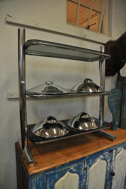 Appraisal: A CHROME TUBULAR SHELVING UNIT