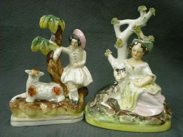 Appraisal: Staffordshire figure depicting girl and her sheep under a tree