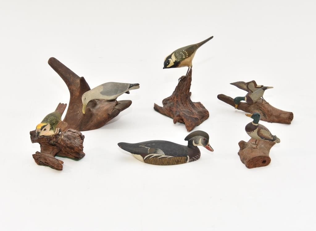 Appraisal: Six wood bird carvings to include a wood duck made