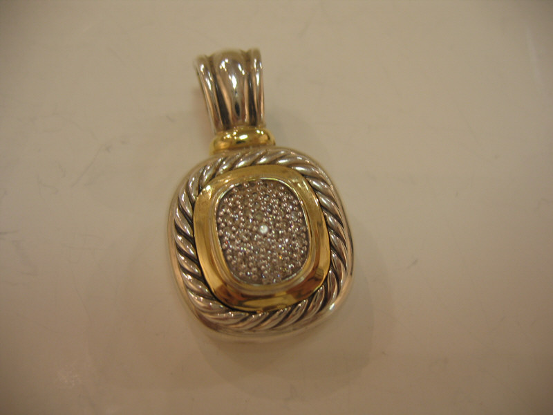 Appraisal: DAVID YURMAN PENDANT Sterling and k yellow gold cable design