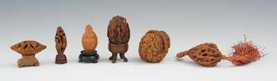 Appraisal: A Group of Walnut and Olive Carvings Containing three walnut