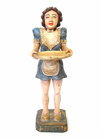 Appraisal: Painted and carved wooden figure of a waitress th century