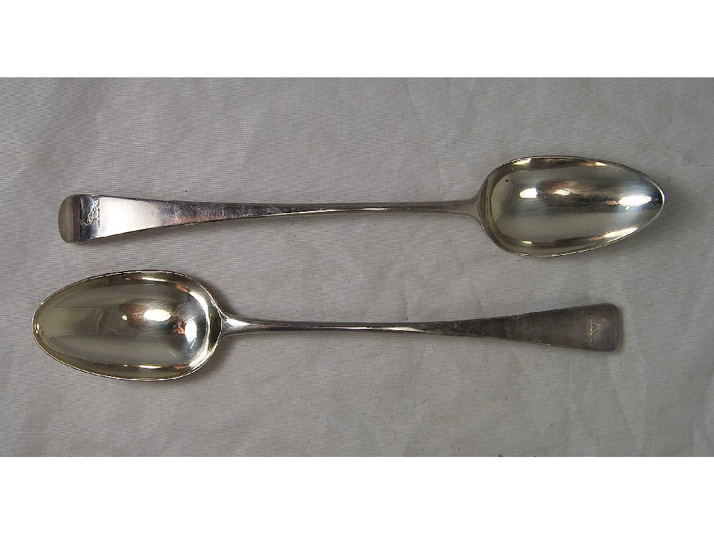 Appraisal: Two Georgian Old English basting spoons bearing crest of peacock