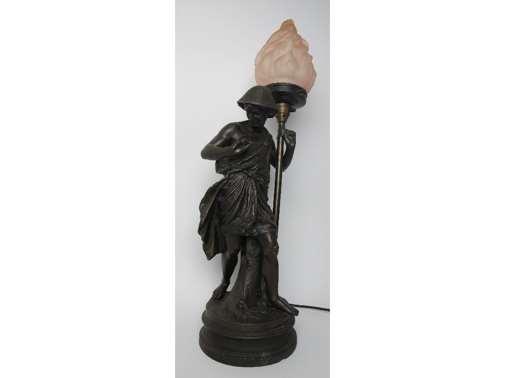 Appraisal: A Victorian spelter table lamp cast as a male figure