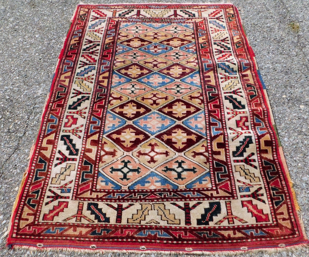 Appraisal: CAUCASIAN TRIBAL RUG Caucuses th CenturyBlue pink red maroon and