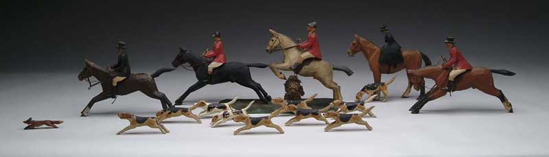 Appraisal: OUTSTANDING CARVED WOOD AND PAINTED FOX HUNT FIGURES The set