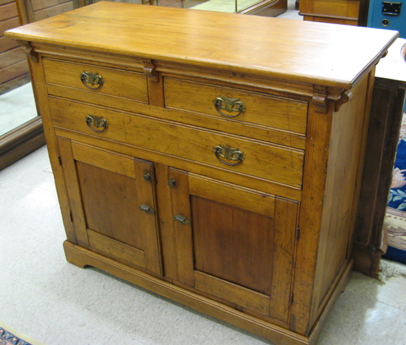 Appraisal: COUNTRY PINE KITCHEN BUFFET American th century having a rectangular