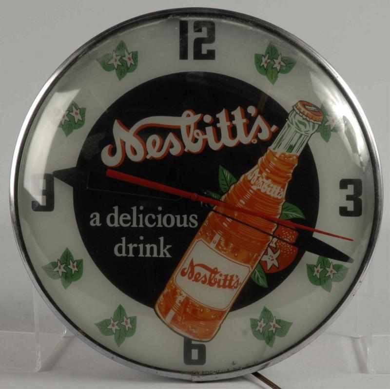 Appraisal: Nesbitt's Cola Light-Up Clock Description Dated Made by Pam Clock