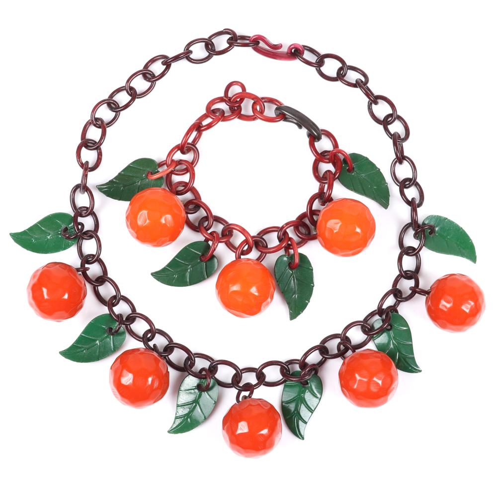 Appraisal: VINTAGE BAKELITE CHOKER NECKLACE AND BRACELET GROUP WITH CARVED ORANGE