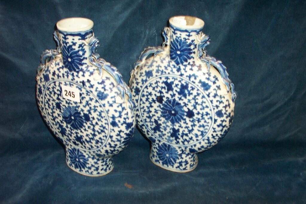 Appraisal: A pair of th century oriental moon flask style vases