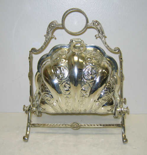 Appraisal: PLATED SILVER SHELL FORM BISCUIT BOX Two-sided hinged mounted in