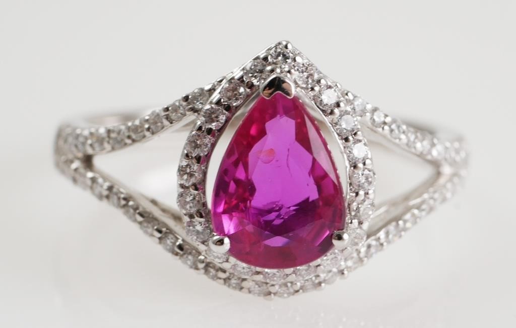 Appraisal: Set in platinum pear shaped mixed cut ruby ct VS