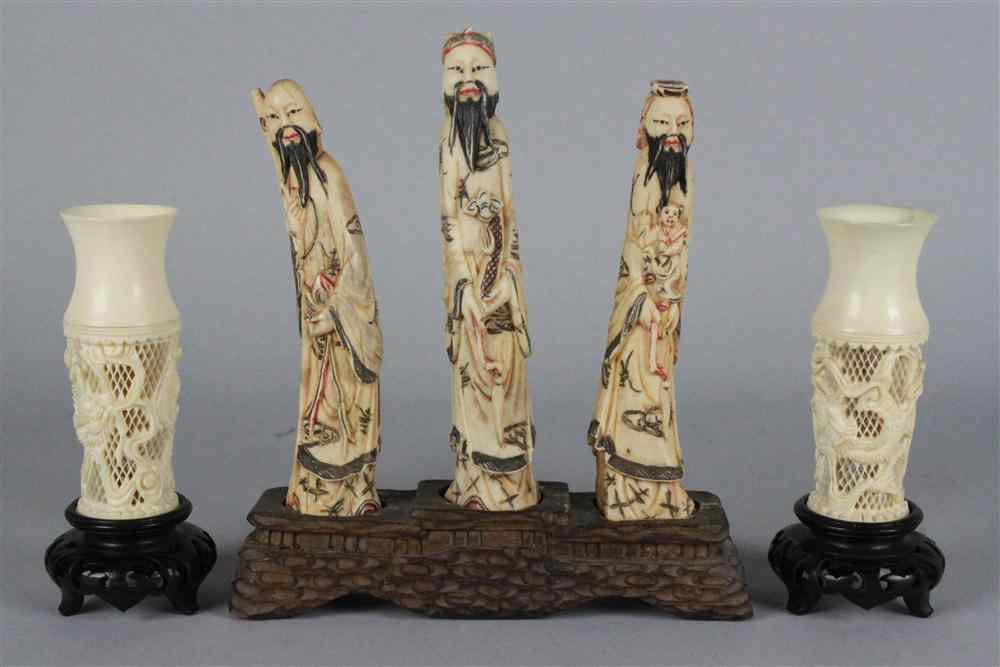 Appraisal: THREE CHINESE BONE CARVINGS carved as bearded sages dressed in