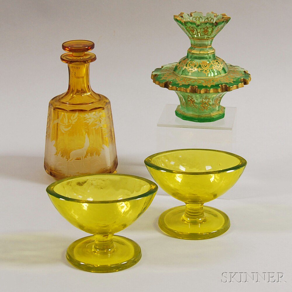 Appraisal: Four Colored Glass Tableware Items th century a Bohemian amber