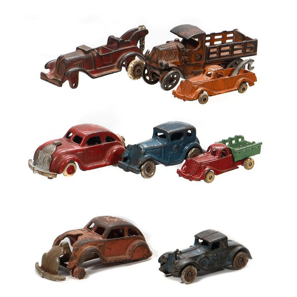 Appraisal: O Gauge size cast iron vehicles Red Coupe - tires