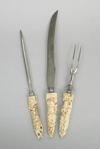 Appraisal: A Three-Piece Carved Bone Handled Carving Set A three-piece carving