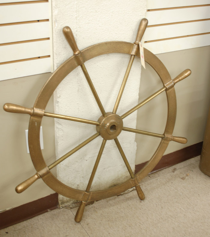 Appraisal: BRASS SHIP'S WHEEL having eight brass spokes and handles overall