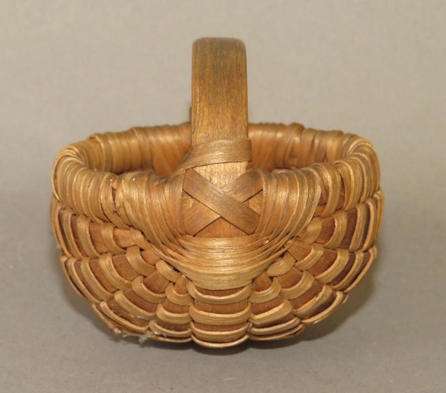 Appraisal: FINE MINIATURE MELON SHAPED HANDLED BASKETca early-mid th century walnut