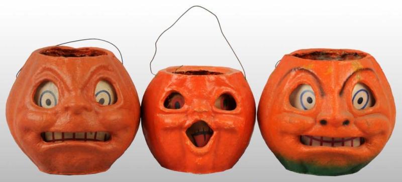 Appraisal: Lot of Pulp Halloween Jack-O-Lanterns Description All include original paper