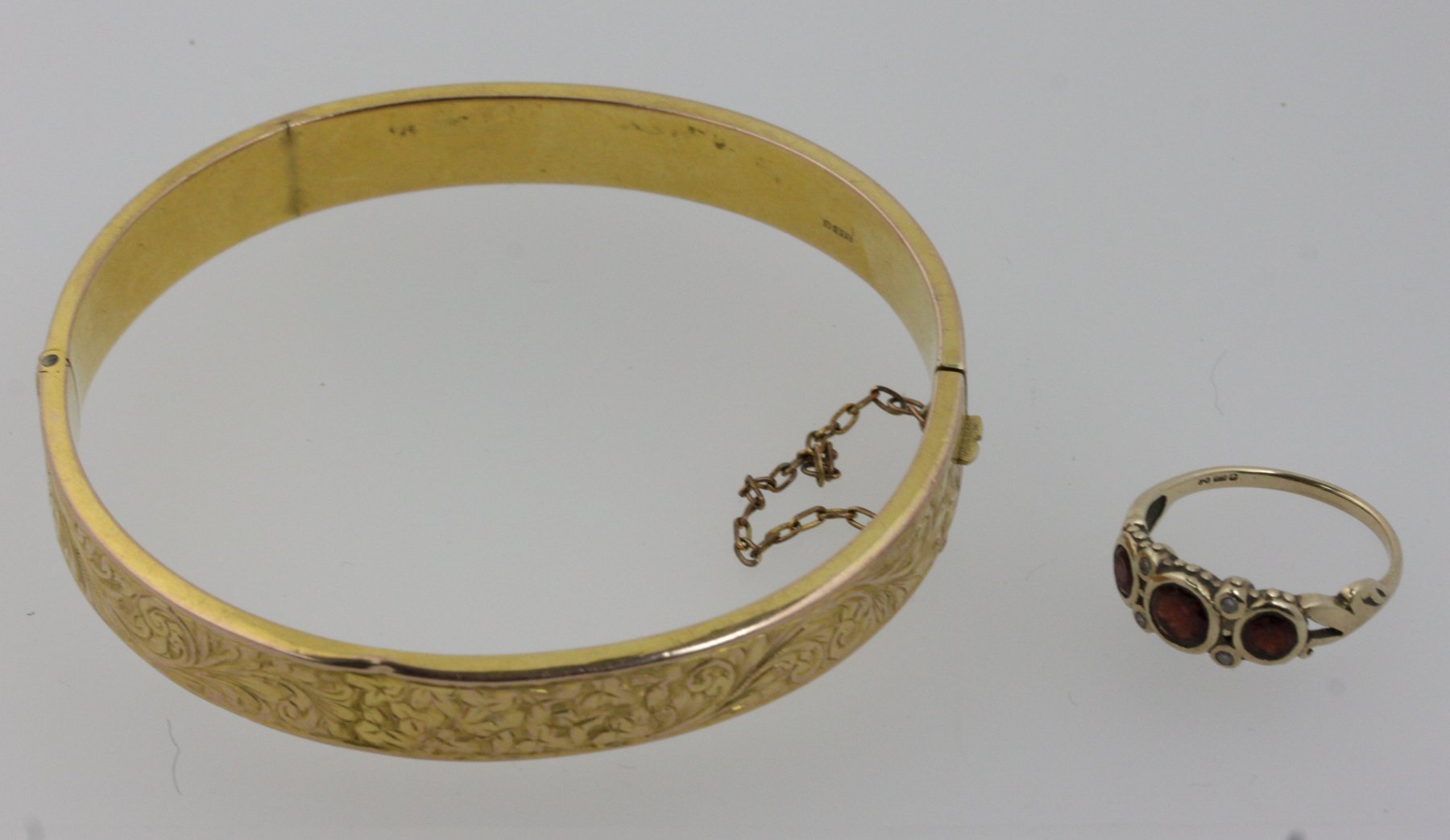 Appraisal: A ct gold hinged bangle approx gm and a dress