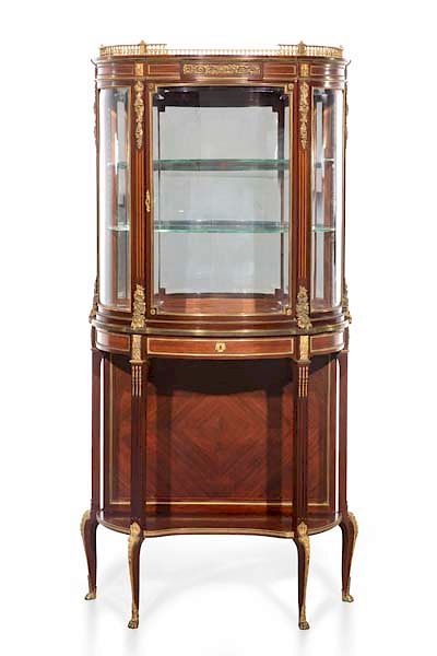 Appraisal: A Louis XVI style vitrine cabinet Paul Sormani A good