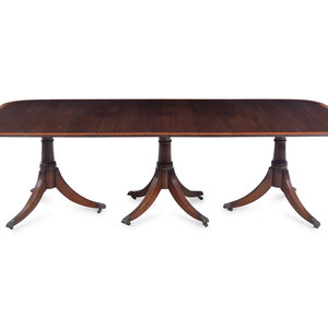 Appraisal: A Regency Style Satinwood Banded Mahogany Triple-Pedestal Dining Table Late