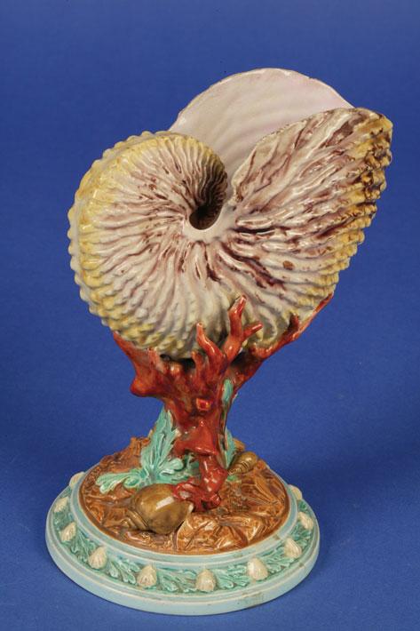 Appraisal: A LATE VICTORIAN ROYAL WORCESTER NAUTILUS SHELL on a coral