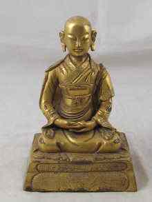 Appraisal: A gilt bronze figure of Buddha ht cm