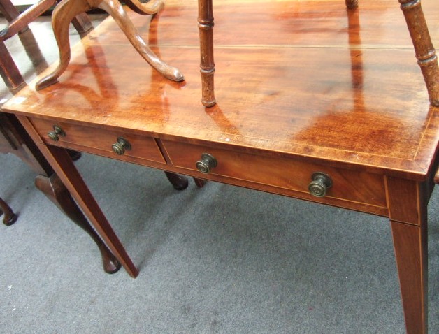 Appraisal: A th century mahogany side table the inlaid rectangular top