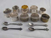 Appraisal: Nine various white metal and plated napkin rings together with