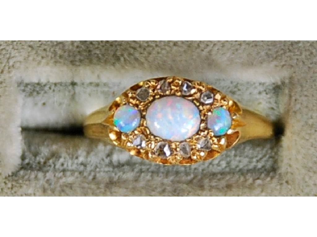 Appraisal: VICTORIAN ct GOLD OPAL AND DIAMOND OVAL CLUSTER RING set