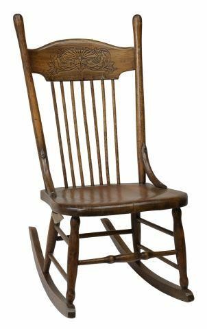 Appraisal: American oak pressback rocking chair c curved top rail rounded