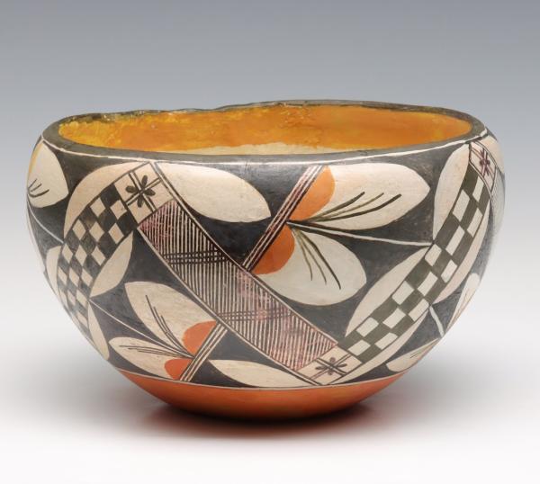 Appraisal: A POLYCHROME ACOMA PUEBLO BOWL WITH RESTORATIONThe restored pottery is