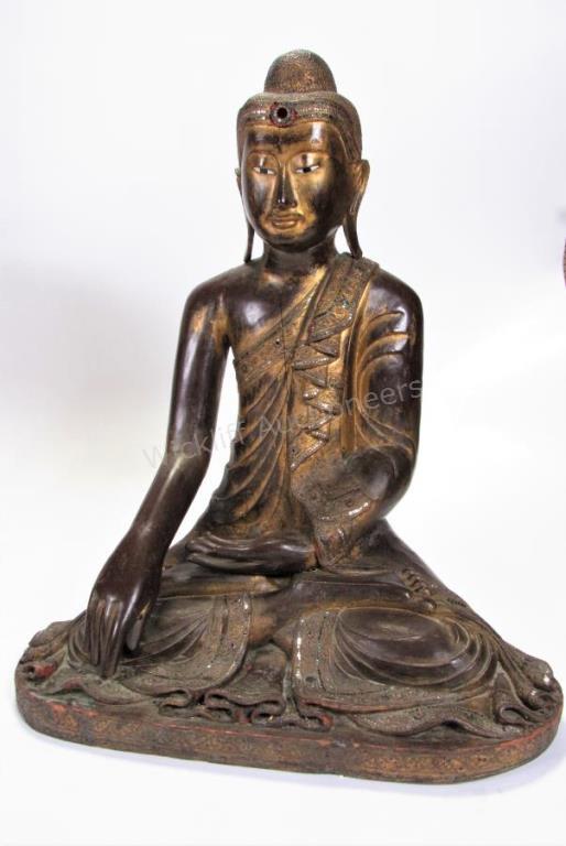 Appraisal: A carved solid wood Buddha figure green white red applied