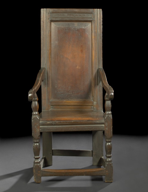 Appraisal: Cromwellian Oak Armchair th century the tall paneled rectangular back