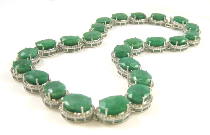 Appraisal: EMERALD AND COLORLESS SAPPHIRE NECKLACE with appraisal The platinum plated