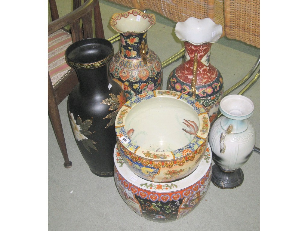 Appraisal: Lot comprising four large vases and two fish bowls