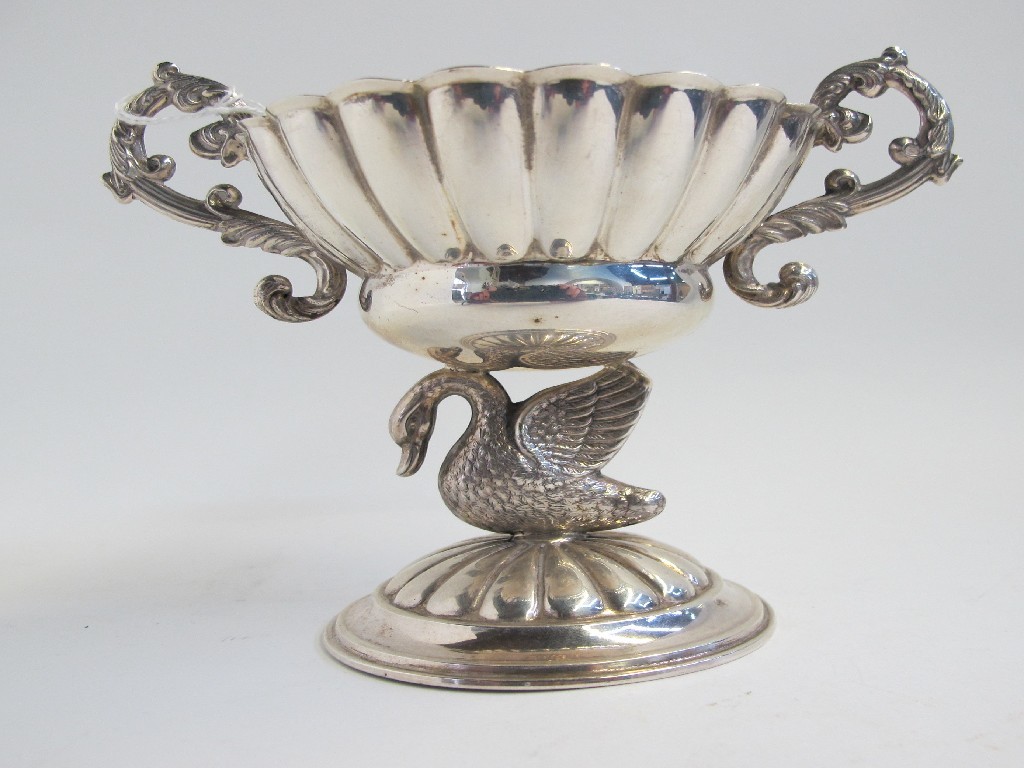 Appraisal: White metal double handled bowl with swan pedestal