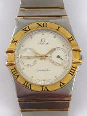 Appraisal: A gent's bi colour metal Omega Constellation wristwatch with day