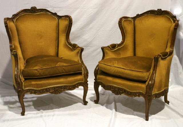 Appraisal: A pair of Louis XV style stained beech armchairs upholstered